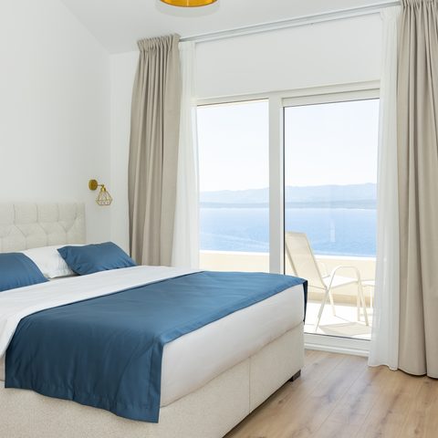 Bedroom with super king bed and sea view balcony