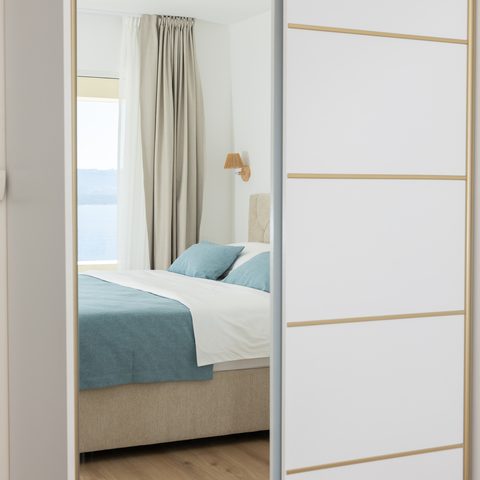 Mirrored sliding wardrobe