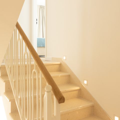 Stone stairs with oak handrail