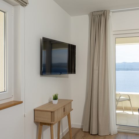 Bedroom with smart TV and terrace