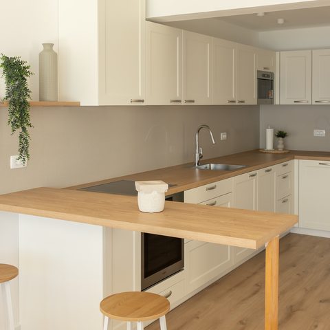 Kitchen with breakfast bar and stools